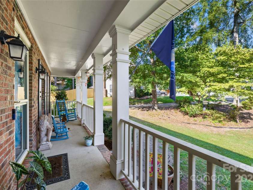 7410 Derby Meadows Court, Charlotte, NC 28216.  MLS# CAR4278987, YatesRealty ID 26335. Full covered front porch