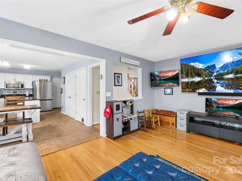 7410 Derby Meadows Court, Charlotte, NC 28216.  MLS# CAR4278987, YatesRealty ID 26335. LR view to kitchen