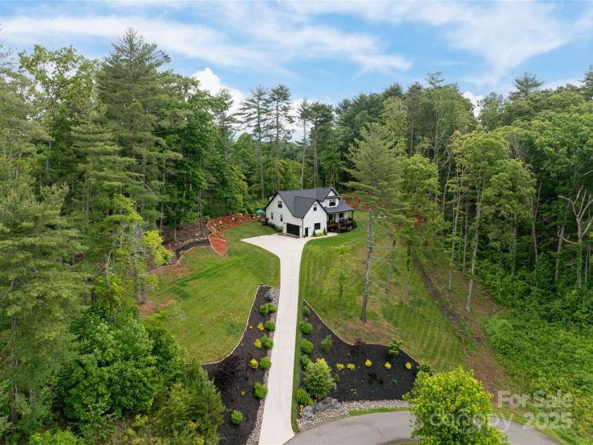 99 Timber Ridge Circle, Leicester, NC 28748.  MLS# CAR4261067, YatesRealty ID 26347. Elevated Mt views - 99 Timber Ridge Circle