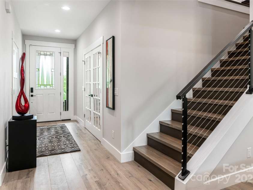 99 Timber Ridge Circle, Leicester, NC 28748.  MLS# CAR4261067, YatesRealty ID 26347. Entrance with custom treds, new railing