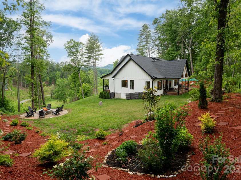 99 Timber Ridge Circle, Leicester, NC 28748.  MLS# CAR4261067, YatesRealty ID 26347. Fire-Pit to relax and take in the 