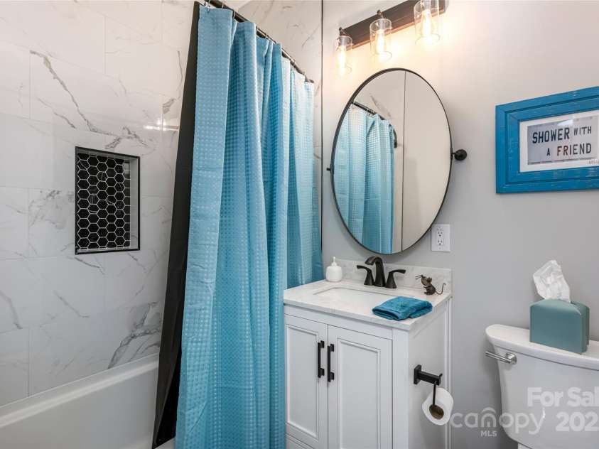 99 Timber Ridge Circle, Leicester, NC 28748.  MLS# CAR4261067, YatesRealty ID 26347. Full custom-tiled Bathroom
