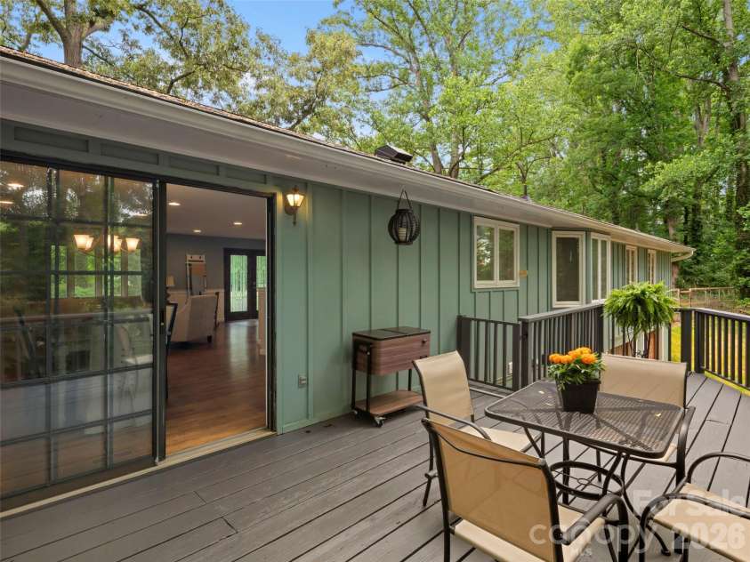 1 Glen Meadows Place, Arden, NC 28704.  MLS# CAR4386745, YatesRealty ID 26350. Access to the back deck from the kitchen