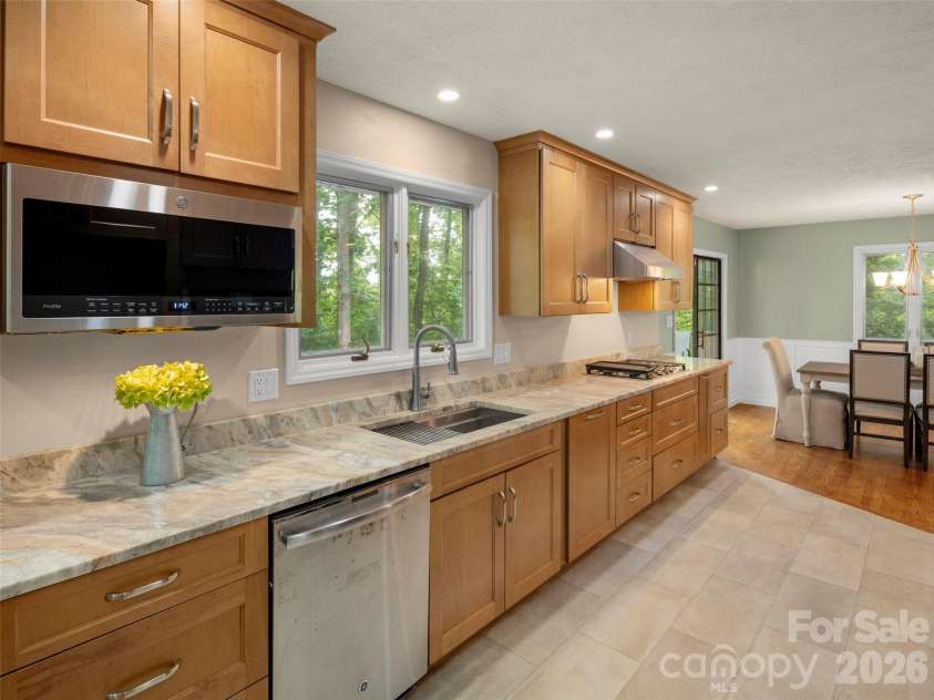 1 Glen Meadows Place, Arden, NC 28704.  MLS# CAR4386745, YatesRealty ID 26350. Stone countertops