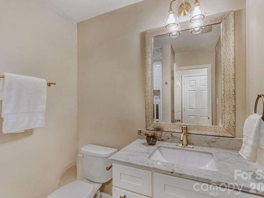 9411 Kings Falls Drive, Charlotte, NC 28210.  MLS# CAR4361281, YatesRealty ID 26352. Downstairs Bathroom