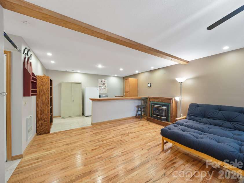 142 Wildflower Road, Spruce Pine, NC 28777.  MLS# CAR4384771, YatesRealty ID 26353. Basement Family/Entertainment Room