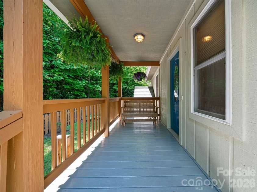 142 Wildflower Road, Spruce Pine, NC 28777.  MLS# CAR4384771, YatesRealty ID 26353. Covered Front Porch