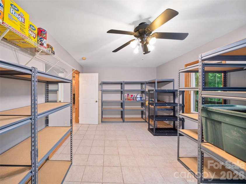 142 Wildflower Road, Spruce Pine, NC 28777.  MLS# CAR4384771, YatesRealty ID 26353. Downstairs Storage Room