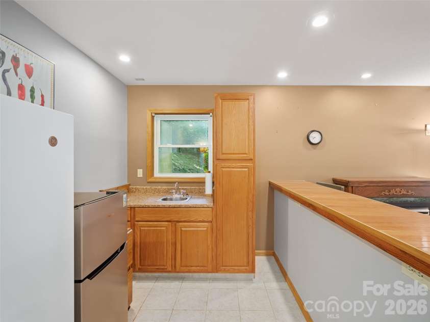 142 Wildflower Road, Spruce Pine, NC 28777.  MLS# CAR4384771, YatesRealty ID 26353. Kitchenette/ Bar