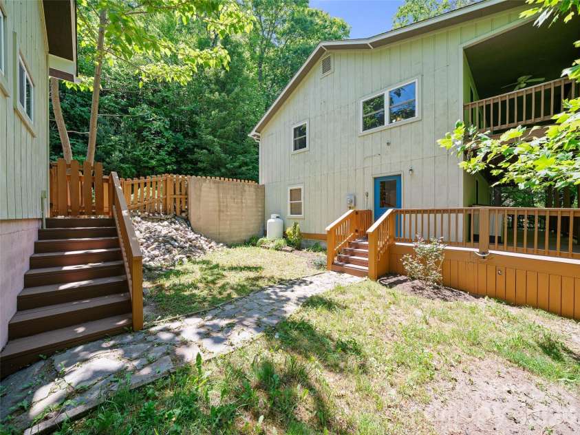142 Wildflower Road, Spruce Pine, NC 28777.  MLS# CAR4384771, YatesRealty ID 26353. Side Yard