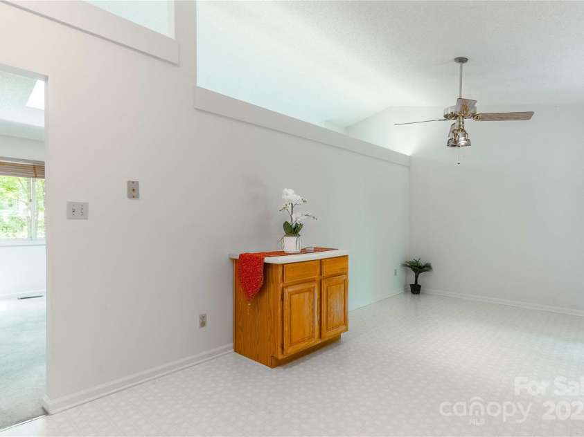 2 Oak Grove Road, Arden, NC 28704.  MLS# CAR4262932, YatesRealty ID 26361. Dining Area w/ Room to Add Larger Kitchen Island if Desired
