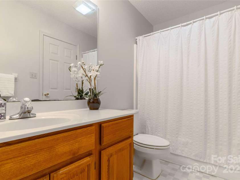 2 Oak Grove Road, Arden, NC 28704.  MLS# CAR4262932, YatesRealty ID 26361. Downstairs Bathroom