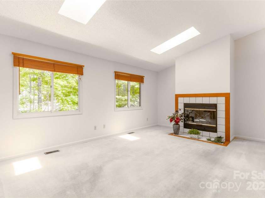 2 Oak Grove Road, Arden, NC 28704.  MLS# CAR4262932, YatesRealty ID 26361. Grand Living Room Entrance with Fireplace!