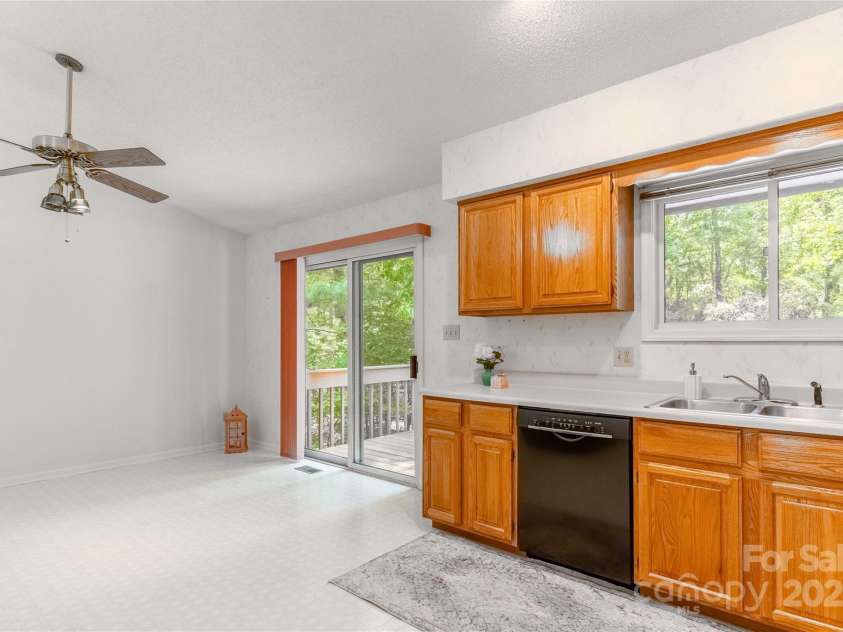 2 Oak Grove Road, Arden, NC 28704.  MLS# CAR4262932, YatesRealty ID 26361. Large Kitchen! To Dining