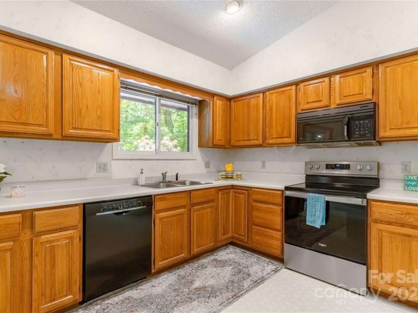 2 Oak Grove Road, Arden, NC 28704.  MLS# CAR4262932, YatesRealty ID 26361. Large Kitchen with Room for additional island!