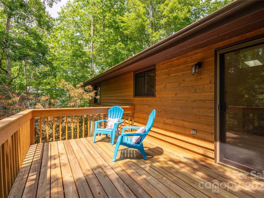 2 Oak Grove Road, Arden, NC 28704.  MLS# CAR4262932, YatesRealty ID 26361. Large Walk-out Deck from Dining/Kitchen