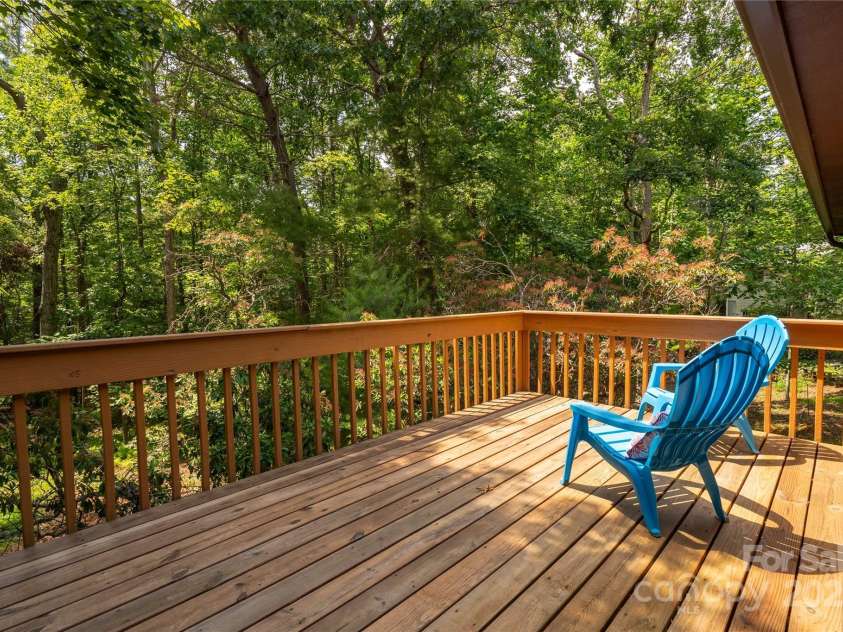 2 Oak Grove Road, Arden, NC 28704.  MLS# CAR4262932, YatesRealty ID 26361. Large Walk-out Deck from Dining/Kitchen-- great vista down to yard!!