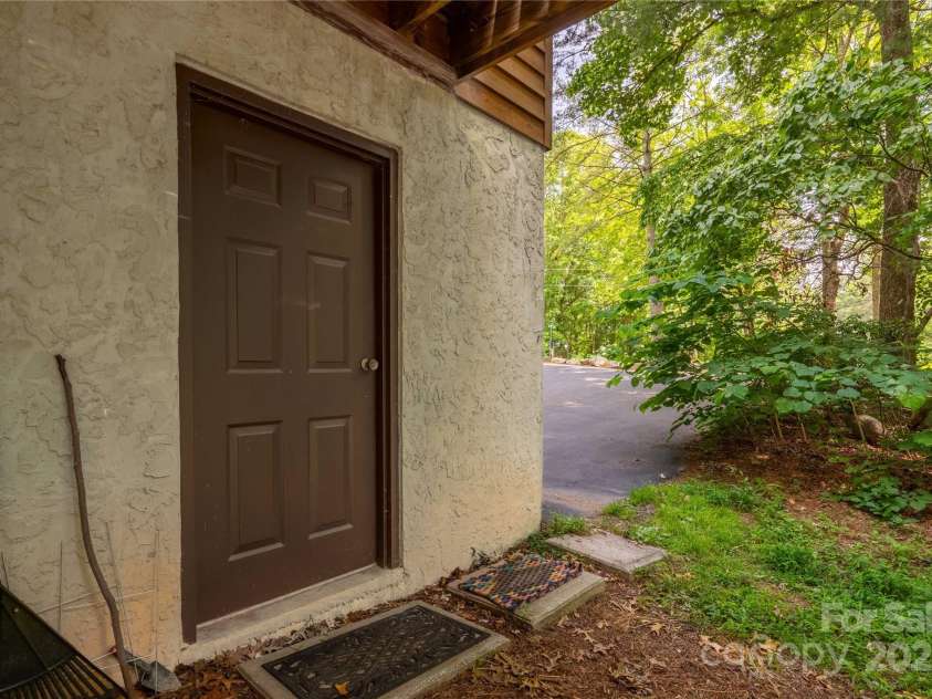2 Oak Grove Road, Arden, NC 28704.  MLS# CAR4262932, YatesRealty ID 26361. Walkout from Garage - Makes Trash Day Easy!