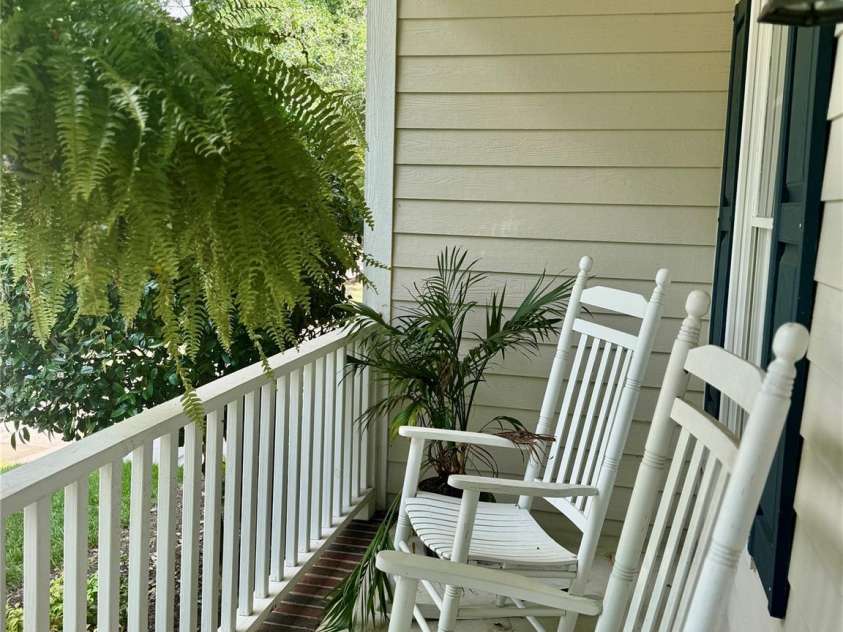 75 Mccurdy Street, Concord, NC 28027.  MLS# CAR4279704, YatesRealty ID 26362. Rocking chair front porch