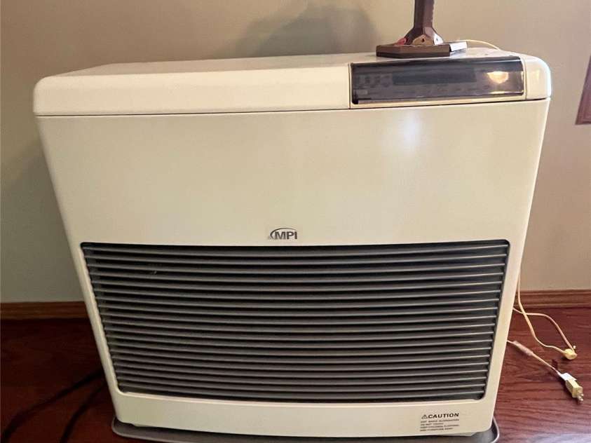 184 Winding Arbor Circle, Cleveland, NC 27013.  MLS# CAR4271297, YatesRealty ID 26364. Kerosene heater