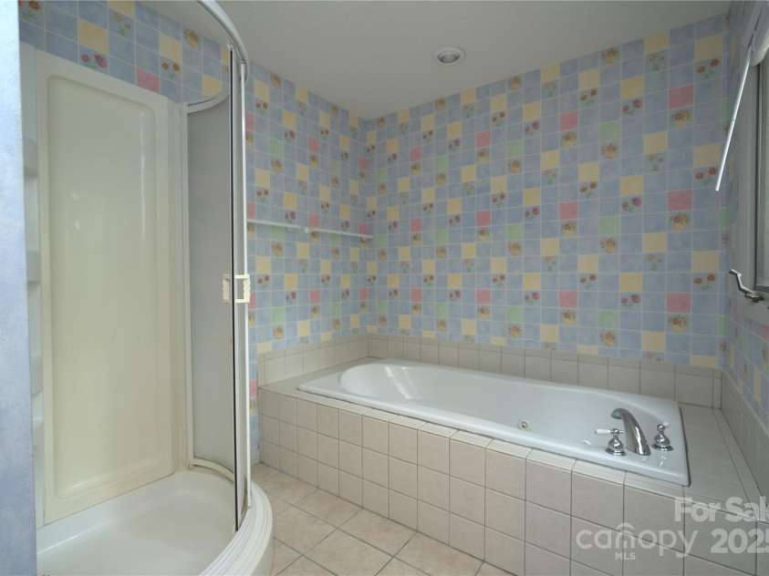 218 McGuffey Ridge Ridge, Gerton, NC 28735.  MLS# CAR4268730, YatesRealty ID 2637. Master bath