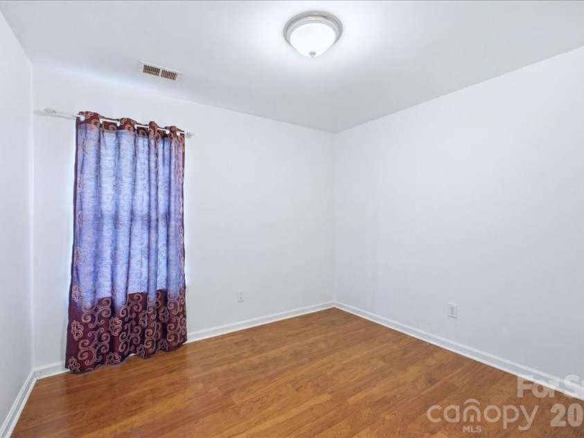 6552 Quarterbridge Lane, Charlotte, NC 28262.  MLS# CAR4386437, YatesRealty ID 26372. Bedroom #3