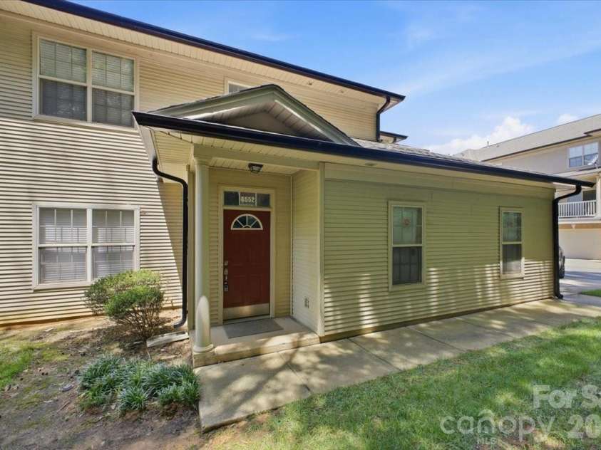 6552 Quarterbridge Lane, Charlotte, NC 28262.  MLS# CAR4386437, YatesRealty ID 26372. Front view