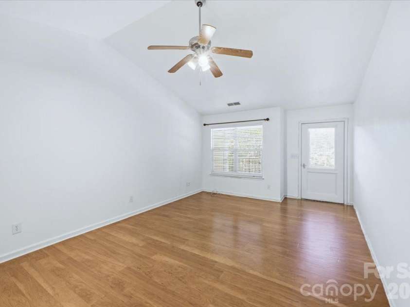 6552 Quarterbridge Lane, Charlotte, NC 28262.  MLS# CAR4386437, YatesRealty ID 26372. Living Rm virtual empty