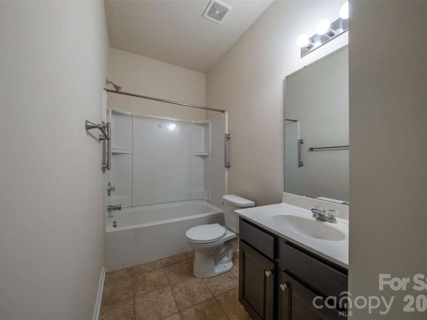 3006 Houndscroft Road, Indian Trail, NC 28079.  MLS# CAR4384765, YatesRealty ID 26373. 1st floor guest suite full bath