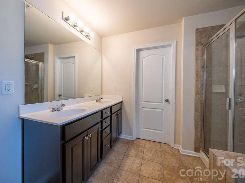 3006 Houndscroft Road, Indian Trail, NC 28079.  MLS# CAR4384765, YatesRealty ID 26373. Master bath