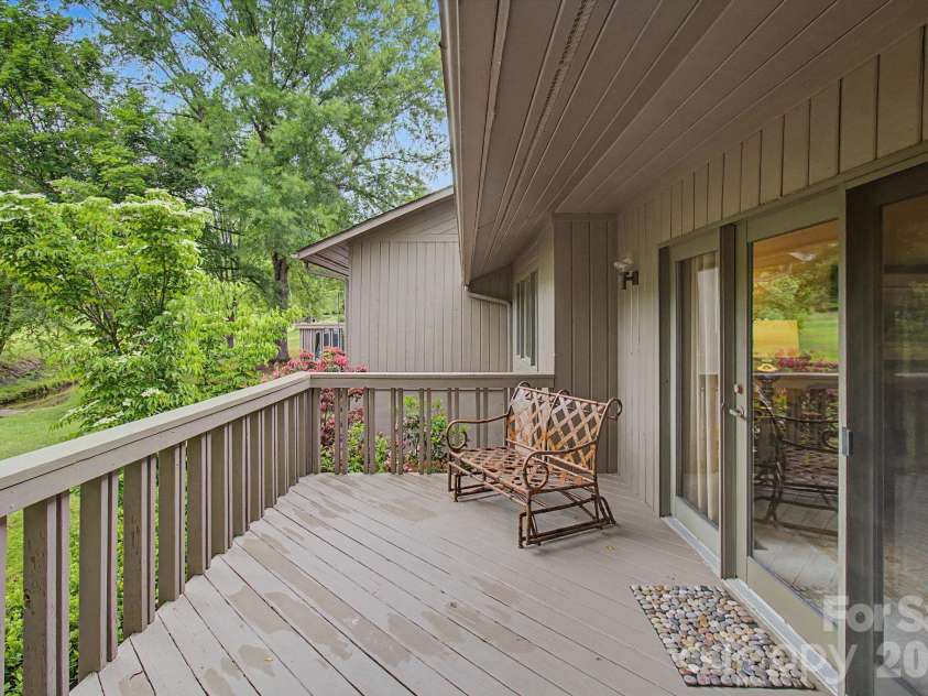 16 Clubside Drive, Asheville, NC 28804.  MLS# CAR4386768, YatesRealty ID 26384. Expansive Decking