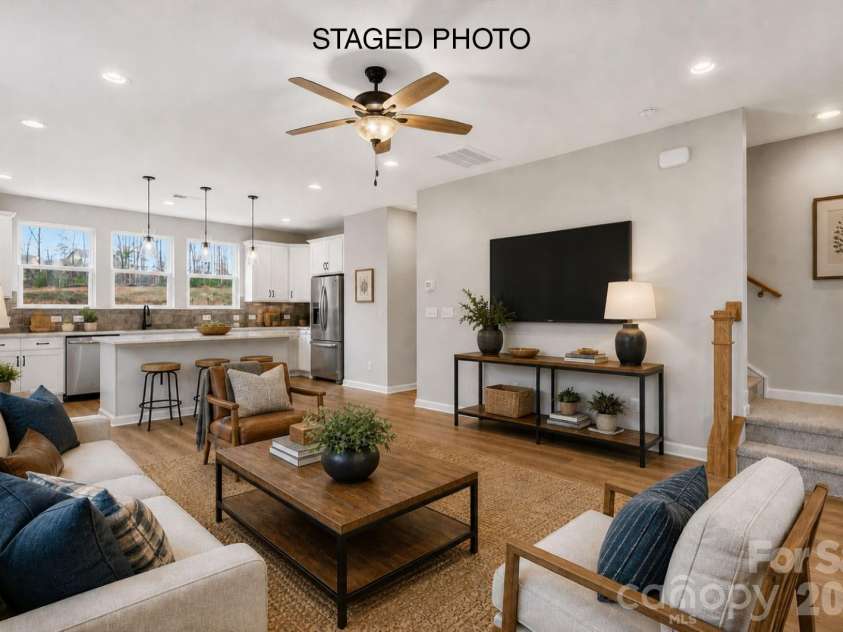 212 Ferebee Place, Charlotte, NC 28213.  MLS# CAR4335439, YatesRealty ID 2639. Living Room/Kitchen *Virtually Staged*
