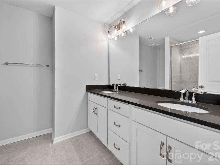 212 Ferebee Place, Charlotte, NC 28213.  MLS# CAR4335439, YatesRealty ID 2639. Premier Bath
