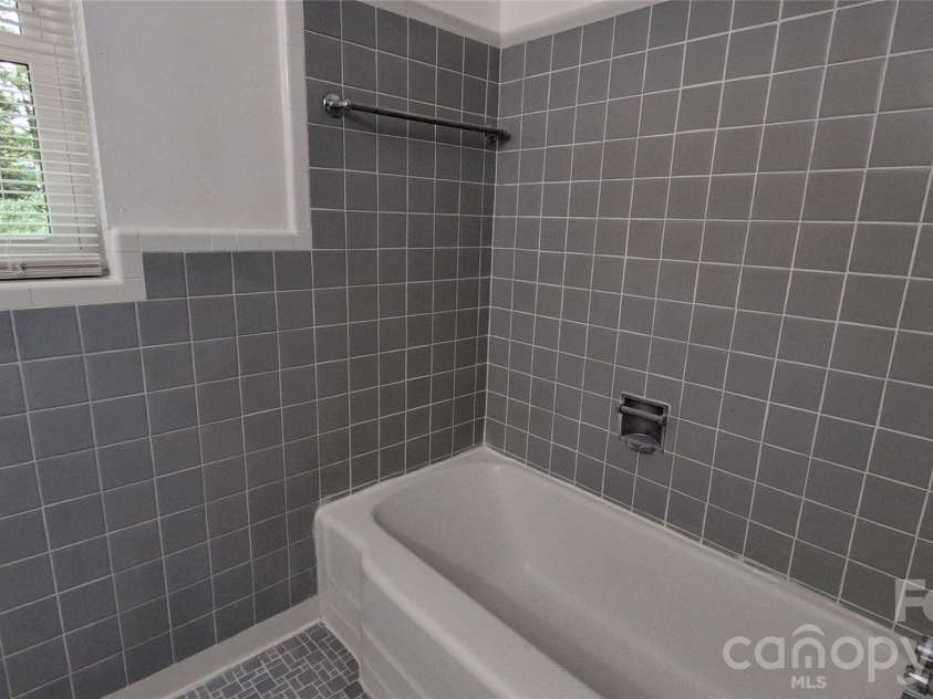 1662 Browns Avenue, Charlotte, NC 28208.  MLS# CAR4385030, YatesRealty ID 26393. Hall Bathroom