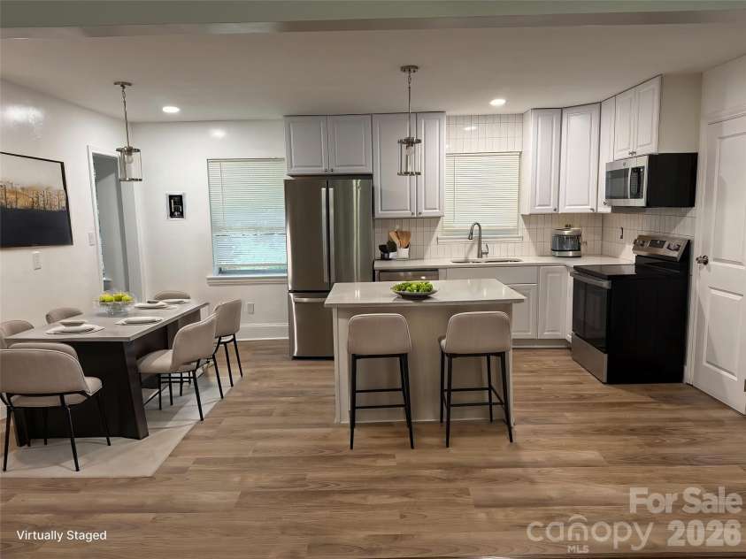 1662 Browns Avenue, Charlotte, NC 28208.  MLS# CAR4385030, YatesRealty ID 26393. Virtually Staged Kitchen/Dining