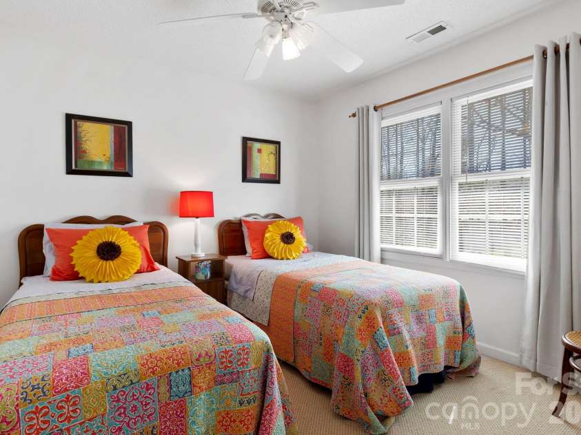 145 Fox Glen Drive, Arden, NC 28704.  MLS# CAR4134713, YatesRealty ID 26394. Guest bedroom on upper level