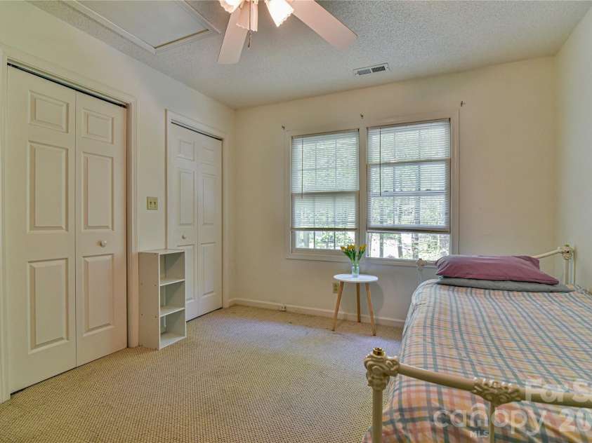 145 Fox Glen Drive, Arden, NC 28704.  MLS# CAR4134713, YatesRealty ID 26394. Second guest bedroom on 2nd level (before bed removed)