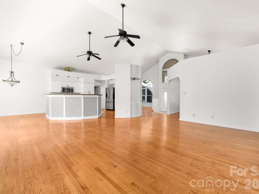 20127 Chapel Point Lane, Cornelius, NC 28031.  MLS# CAR4423446, YatesRealty ID 26399. Open Concept Kitchen & Family Room