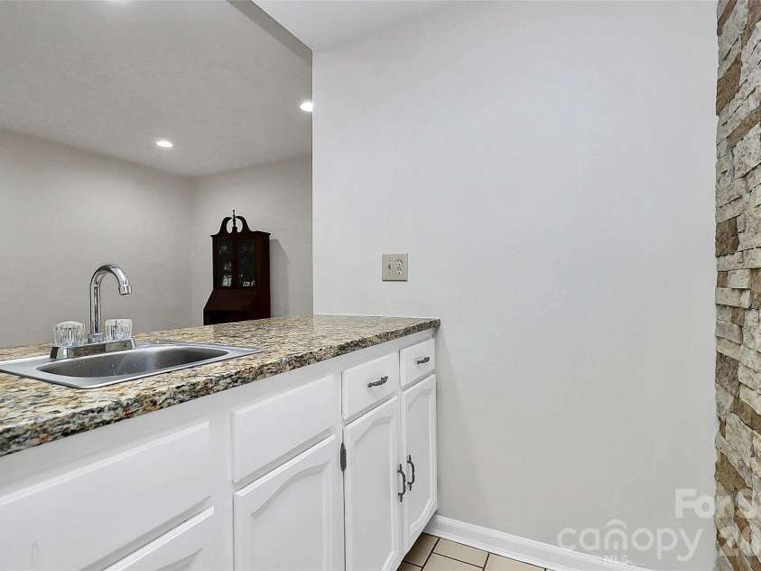 16 Woodvine Lane, Clover, SC 29710.  MLS# CAR4303329, YatesRealty ID 2640. Low Level Bathroom