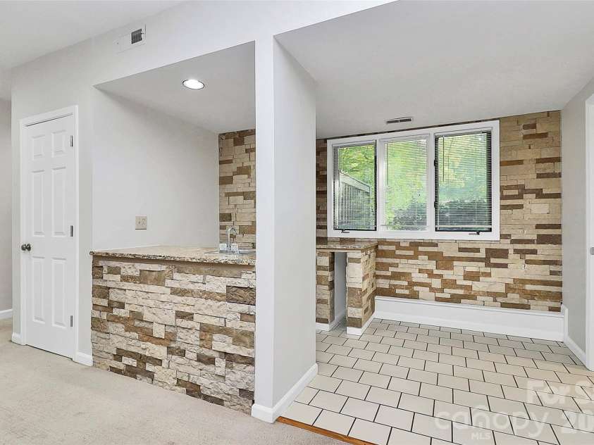 16 Woodvine Lane, Clover, SC 29710.  MLS# CAR4303329, YatesRealty ID 2640. Lower Level Wet Bar