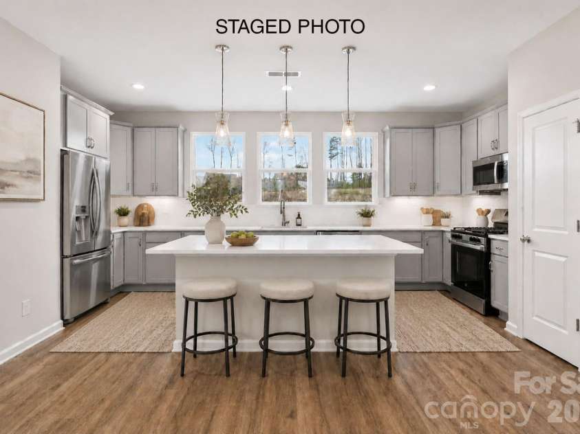 228 Ferebee Place, Charlotte, NC 28213.  MLS# CAR4335382, YatesRealty ID 2640. Kitchen *Virtually Staged*