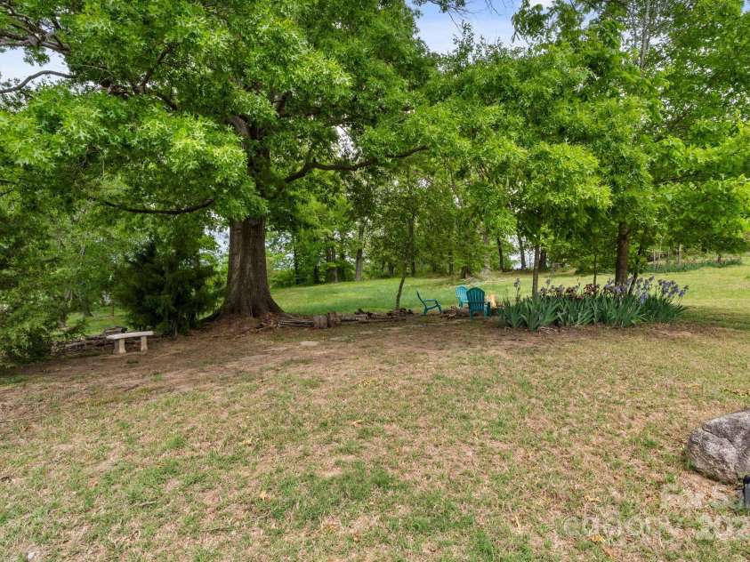 176 Jennymarie Road, Mooresville, NC 28115.  MLS# CAR4249290, YatesRealty ID 26401. Tree & Land owned by HOA