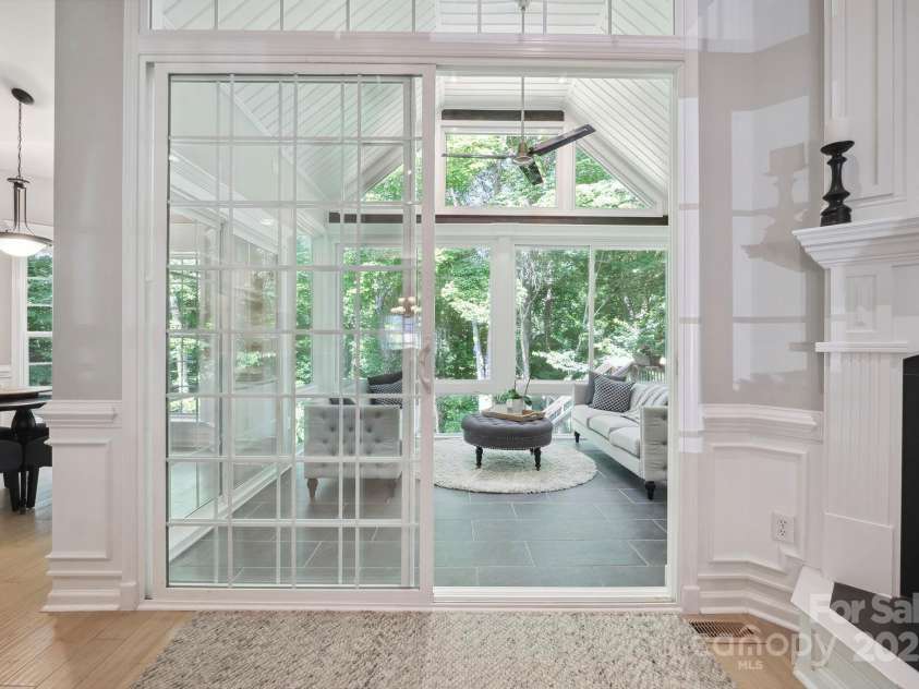 7025 Sedgebrook Drive, Stanley, NC 28164.  MLS# CAR4276849, YatesRealty ID 26407. Gorgeous Entry to Sun Room Through Oversize Glass Slider with Architectural Transom.