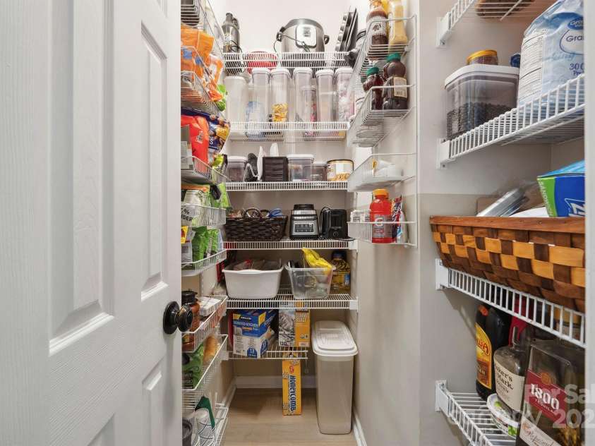 7025 Sedgebrook Drive, Stanley, NC 28164.  MLS# CAR4276849, YatesRealty ID 26407. Large Walk-In Pantry in Kitchen.
