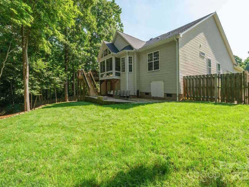7025 Sedgebrook Drive, Stanley, NC 28164.  MLS# CAR4276849, YatesRealty ID 26407. Private Fenced Rear Yard Backs Up to Neighborhood Open Space.