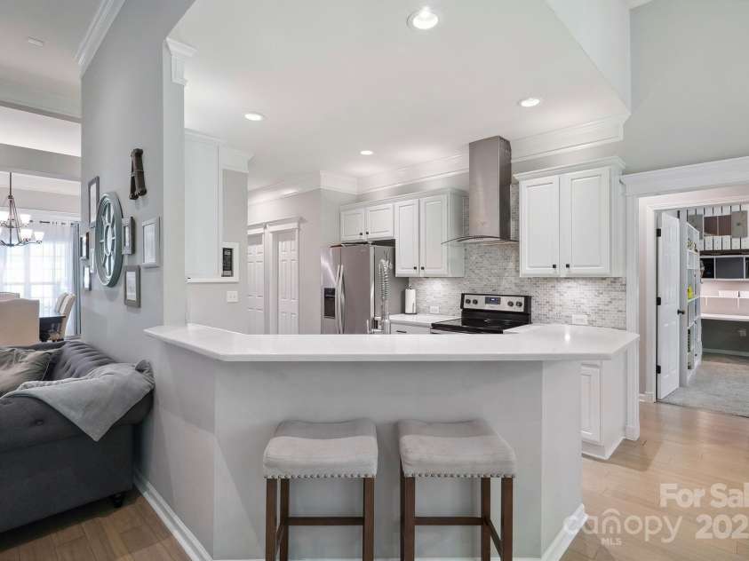 7025 Sedgebrook Drive, Stanley, NC 28164.  MLS# CAR4276849, YatesRealty ID 26407. Sleek Quartz Tops and Stainless Appliances.