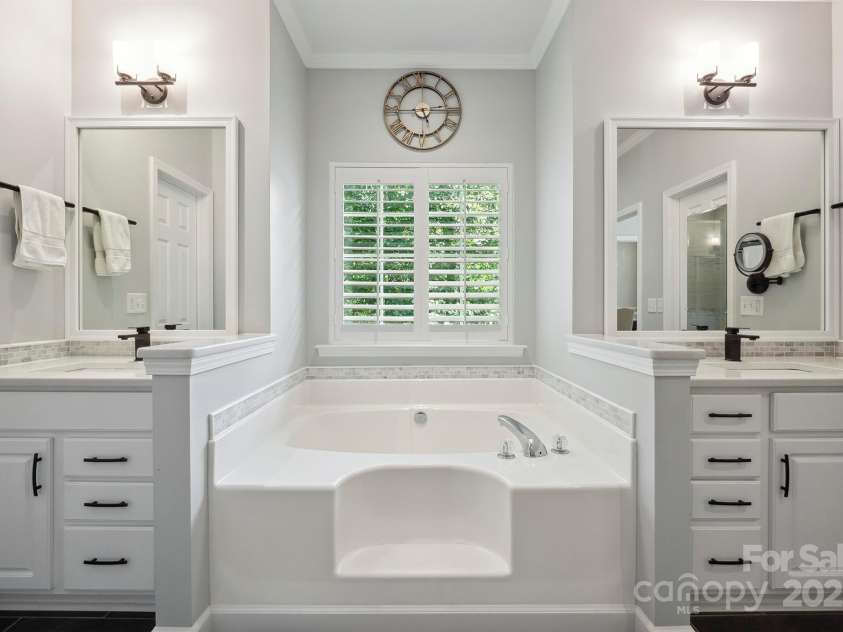 7025 Sedgebrook Drive, Stanley, NC 28164.  MLS# CAR4276849, YatesRealty ID 26407. Spectacular Dual Quartz Vanities with Mosaic Marble Backsplash.