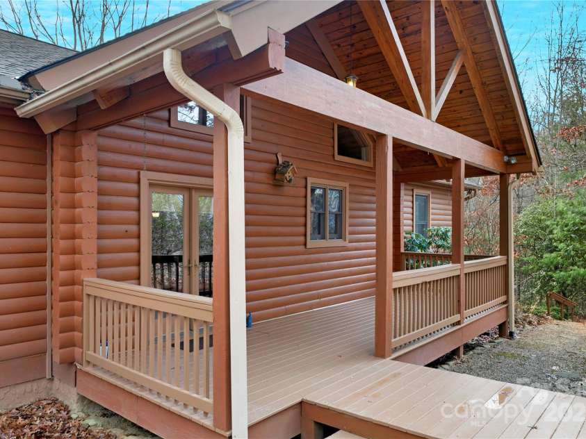 42 Tsitsi Court, Brevard, NC 28712.  MLS# CAR4326496, YatesRealty ID 2641. Front covered porch