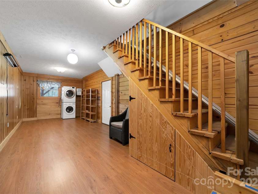 42 Tsitsi Court, Brevard, NC 28712.  MLS# CAR4326496, YatesRealty ID 2641. Lower level flex space