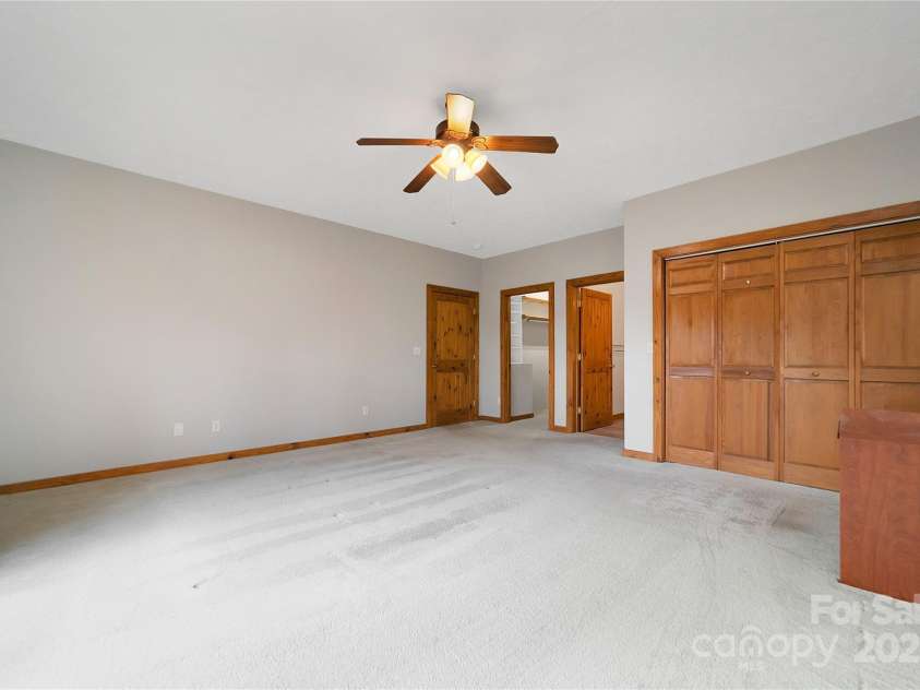 42 Tsitsi Court, Brevard, NC 28712.  MLS# CAR4326496, YatesRealty ID 2641. Primary bedroom